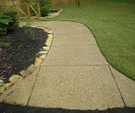 Working With Concrete Contractors To Maintain A Home’s Driveway